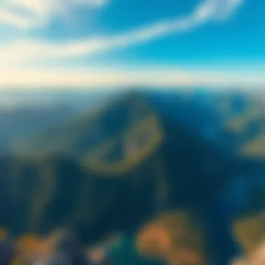 A stunning aerial view showcasing a mountain range with lush forests and a winding river below.