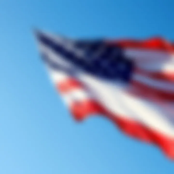 American flag waving in the wind A vibrant American flag waving against a bright blue sky, symbolizing patriotism before the 4th of July.