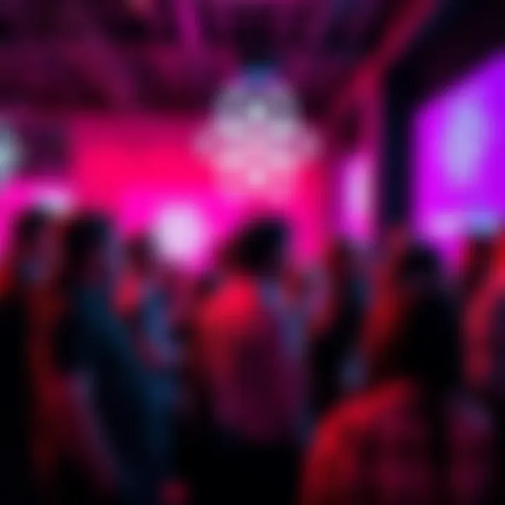 A group of people discussing Creact, a universal reactive runtime, at a tech event.