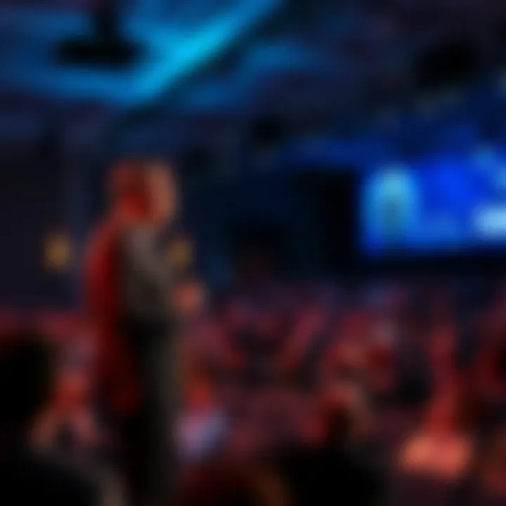 Dario Amodei stands on stage discussing AI trends at the Morgan Stanley TMT Conference, with an audience engaged in the background.