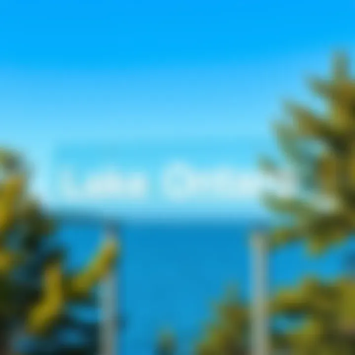 A clear sign displaying the name Lake Ontario near the water, with trees and a blue sky in the background.