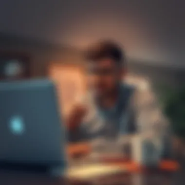 Individual with a thoughtful expression using a laptop, surrounded by notes and a cup of coffee, illustrating the struggle with creativity and mental health.