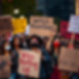 A diverse group of people holding up signs during a protest against witch-hunting behaviors, showing strong emotions and solidarity.