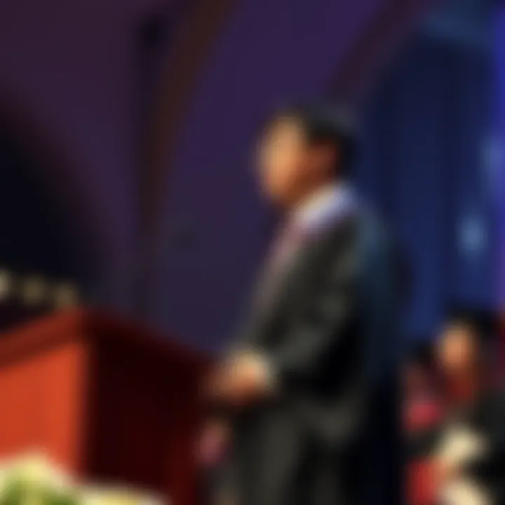 Ronny Chieng stands on stage at Harvard graduation ceremony, addressing graduates about AI.