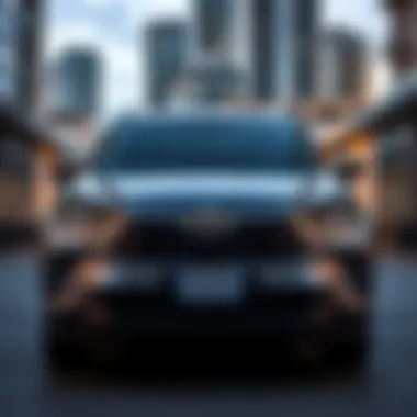 Front view of the new Toyota Electric Highlander parked in a modern urban setting, showcasing its sleek design and electric features.