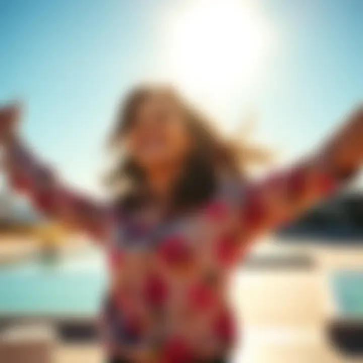 A woman joyfully celebrating her achievements with a bright smile and raised arms in a sunny outdoor setting.